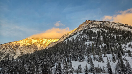 Winter Sunset on I-70 in Colorado, Traveling along I-70 in Colorado during the Winter, between Vail...