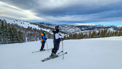 Grandfather & Grandson Snow Skiing in Colorado