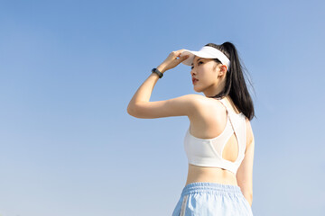 Young woman exercising in a park