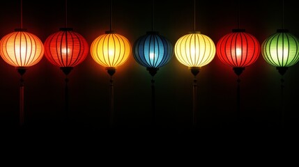 Obraz premium Colorful Illuminated Lanterns Hanging Dark Background