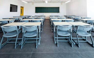 Modern classroom with desks and chairs