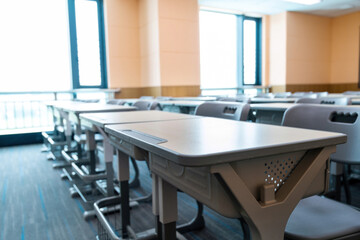 Modern classroom with desks and chairs