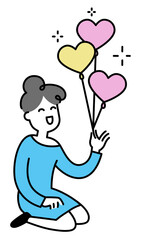 Young woman holding heart-shaped balloons