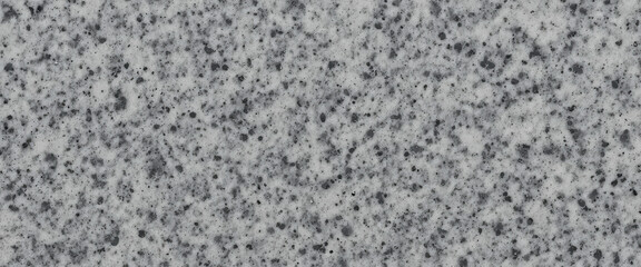 A close-up view of a textured granite surface.
