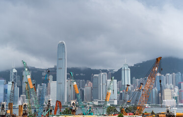 Naklejka premium Construction site in Hong Kong , with modern skylines in the background