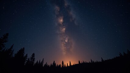 Naklejka premium A majestic vista captures the swirling arms of the Milky Way arching across a deep, dark-blue expanse dotted with countless twinkling stars. The horizon hints at unseen mysteries below. 