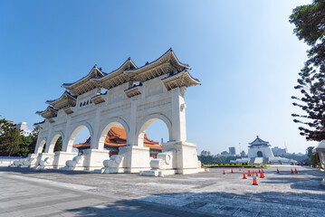 Fototapeta premium The main gate of National Chiang Kai-shek (CKS) Memorial Hall, the landmark for tourist attraction in Taiwan. st hand holding smartphone while taking a photograph of jiufen Culture Village Taipei, 