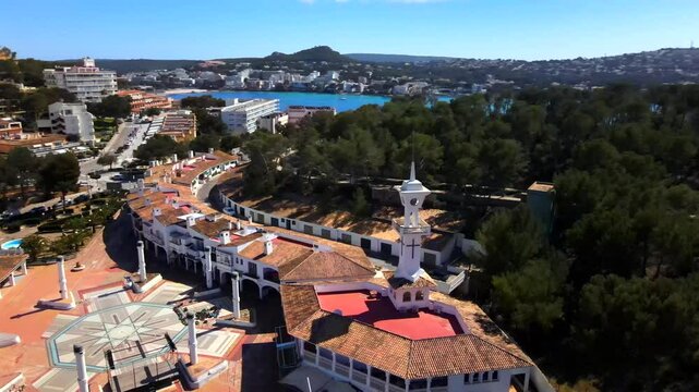 Enjoy breathtaking views of Santa Ponsa's coastal scenery and unique architecture. Observe the vibrant surroundings and peaceful atmosphere of this beautiful Mallorca destination.