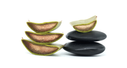 Aloe Vera Slices and Zen Stones on White Background