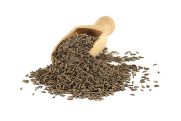 Wooden scoop pouring caraway seeds on white background