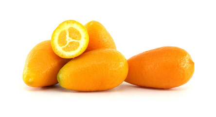 Fresh kumquats showing pulp on white background