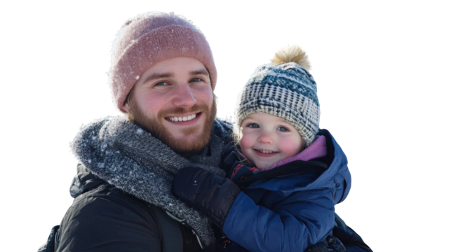 Happy father and daughter in warm winter clothing smiling on an isolated bright snowy outdoor background.