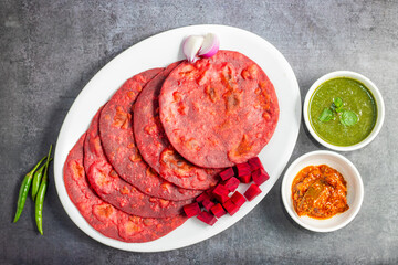 Beetroot paratha is a vibrant, soft Indian flatbread made with whole wheat flour, grated beetroot, and spices. Nutritious and flavorful!