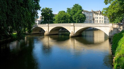 Scenic view of a stone bridge over a calm river.
