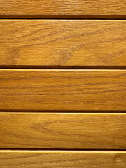 Naklejka premium a wooden board wall with a natural pattern