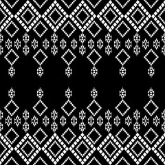 The geometric ethnic pattern of traditional style. Navajo, America Indian patterns. Design for background, wallpaper, clothing, wrapping, Batik, fabric, and prints. Vector illustration.