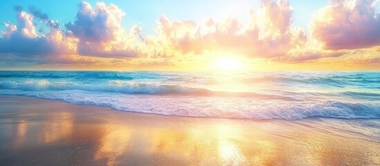 Vibrant sunrise over tranquil ocean waves on sandy beach.