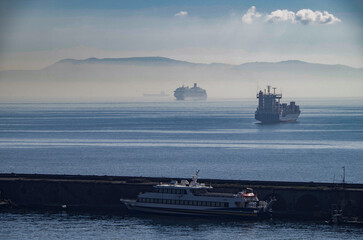 Modern cruiseship cruise ship liner Fascinosa arrival into Napoli Naples, Italy port during summer...