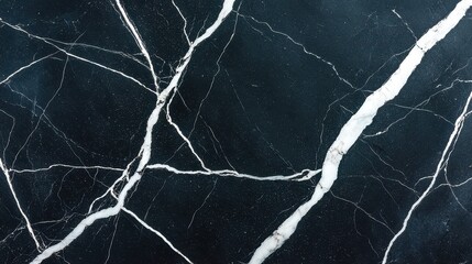 Elegant Black Marble Surface with White Veins and Unique Patterns