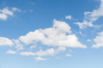 Fototapeta premium Clear blue sky with some white clouds