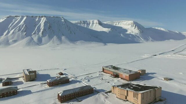 Pyramiden Town in Spitsbergen, Svalbard and Jan Mayen under heavy snow, Aerial view