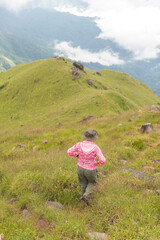 Fototapeta premium Lifestyle traveler happy feeling good relax and freedom facing in the sunrise morning. Travel Concept