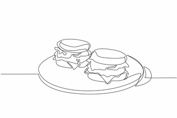 Single continuous line drawing 2 pcs English muffins on a round wooden cutting board. Will be served to a more appropriate place. National English Muffin Day. One line design vector illustration