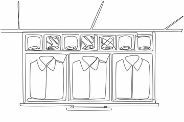 Single one line drawing wardrobe drawer opened and inside there are shirts and ties in various colors. Shirts are separated by color. Get Organized Day. Continuous line design graphic illustration