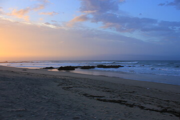 Sunrise by a deserted beach in a secret spot in Africa