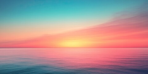 Vibrant gradient sunset over a calm sea with hues of pink, orange and blue blending seamlessly in the sky reflecting on the water.