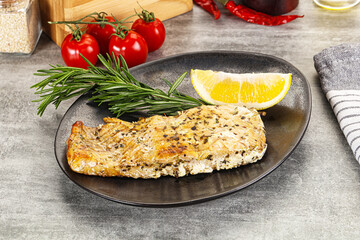 Baked salmon fish served rosemary