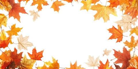 Fototapeta premium Autumn leaves in vibrant oranges and yellows frame a white center space, arranged horizontally to create a seasonal border effect.