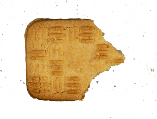 bite of butter biscuit on white background