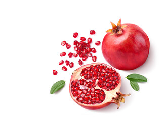 Flat lay of ripe pomegranate with cut in half isolated on white background.