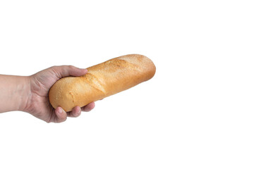 A hand holds out a bread baguette, close-up on a white background, isolate