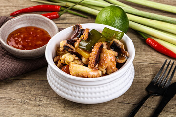Roasted octopus with vegetables and oil