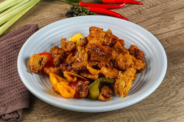 Asian cuisine - roasted crocodile meat