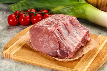 Raw pork loin cut with bone