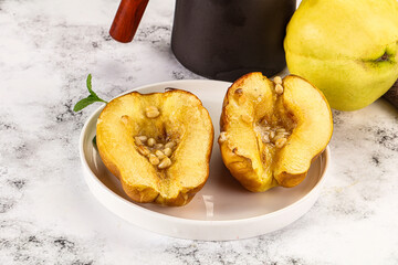 Baked quince with honey and cedar