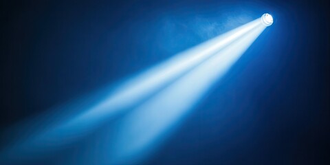 Bright blue light beam shining diagonally from the top left corner against a deep blue background, creating a dramatic atmosphere with fog effects.