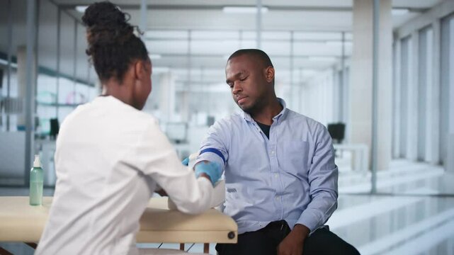 Close-up Of Doctor Taking Blood Sample