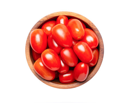 cherry tomatoes in wooden bowl isolated on white