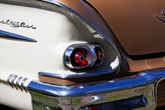 Umea, Norrland Sweden - June 29, 2024: funny and nice lights on an old car in light pink