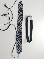 Beaded choker and bracelet with ethnic ornaments