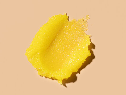 scrub cream texture on beige background skin care concept