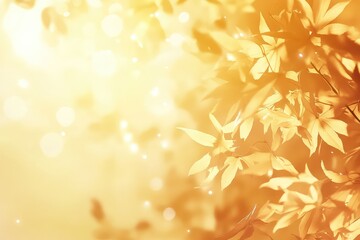A dreamy autumn background with blurred golden maple leaves and a soft sunlight filter.