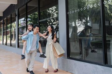 Family shopping adventure in a modern mall outdoor setting candid moments for memorable experiences