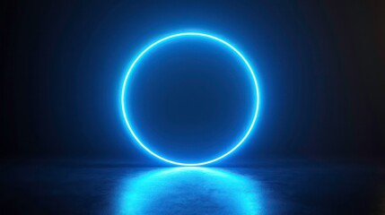 Glowing blue neon circle light on dark background, reflecting on floor.