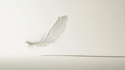 Fototapeta premium Delicate Feather Floating in Mid-Air Against a Vast White Space, Capturing the Stillness and Quiet Power of Silence