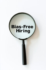 A magnifying glass with the words 'Bias-Free Hiring' emphasizes the importance of fairness in recruitment processes.